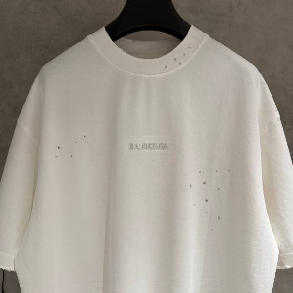 BALENCIAGA MODEL WITH COLD-PRESSED TEXT ON IT 3