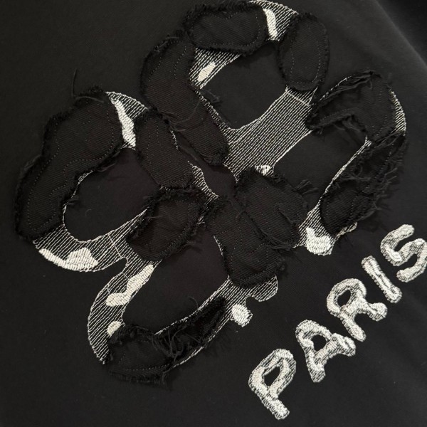 BALENCIAGA BLACK, WITH BLACK WRITING ON IT. 3