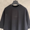 BALENCIAGA MODEL IN BLACK WITH COLD-PRESSED PRINTED TEXT ON IT 3