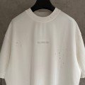 BALENCIAGA MODEL WITH COLD-PRESSED TEXT ON IT 3